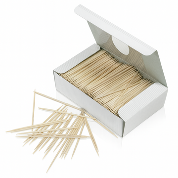 Box of toothpicks with some sticks spilling out on a white background