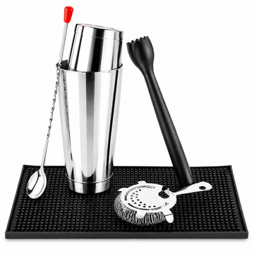A 6-piece cocktail bar tool set arranged on a black rubber mat against a white background. The set includes a stainless steel cocktail shaker with a red-tipped spoon, a black strainer, a black muddler, a metal jigger, a bar spoon, and a small cleaning brush.
