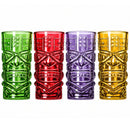 Four tiki-style tumblers in green, red, purple, and gold, arranged side by side on a plain white background.