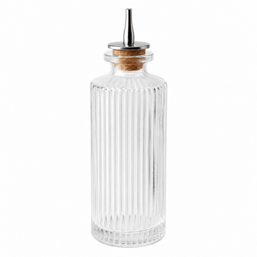Clear glass bitter bottle with a wooden cap on a white background
