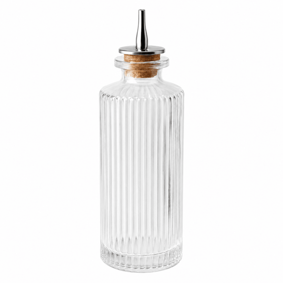 Clear glass bitter bottle with a wooden cap on a white background