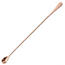 Rose gold bar spoon on a white background