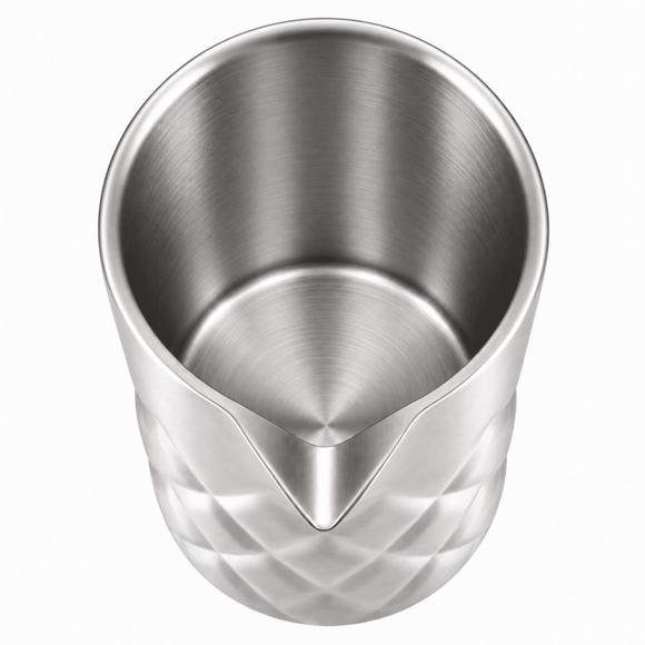A brushed stainless steel mixing pitcher with a diamond-textured exterior and a pouring spout, shown from a top-down angle on a white background.