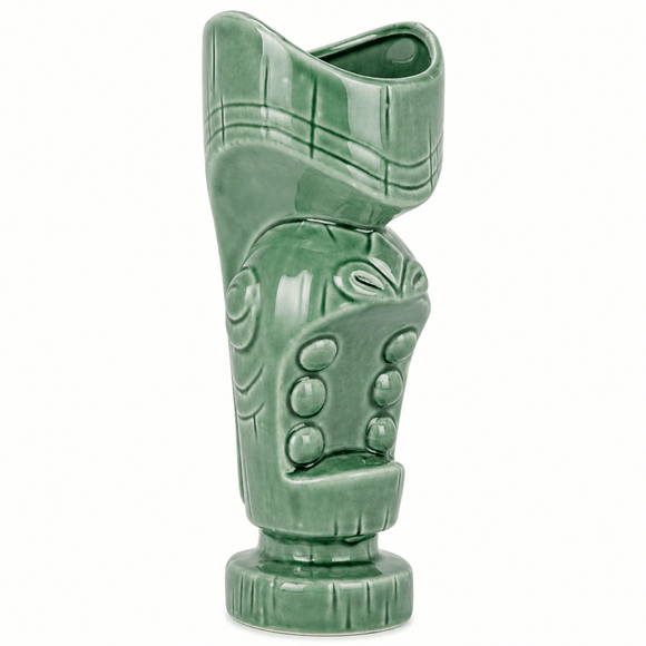 A green glazed ceramic tiki mug with a sculpted tiki head design, shown against a plain white background.