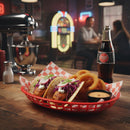 Bowl of tacos with onion rings and a bottle of Coca-Cola in a casual dining setting.