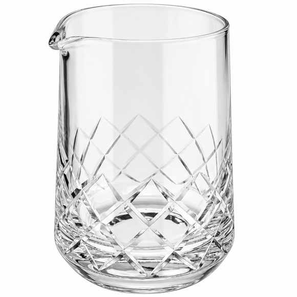 Clear glass cocktail mixing pitcher with a diamond-cut pattern on the lower half and a small pouring spout, shown on a white background.
