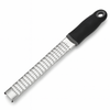 Metal zester with black handle on a white background