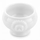 White ceramic bowl with textured design on a white background