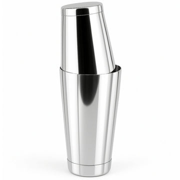 A two-piece stainless steel Boston cocktail shaker set with a large tin nested inside a smaller tin, reflecting light on its polished surface.